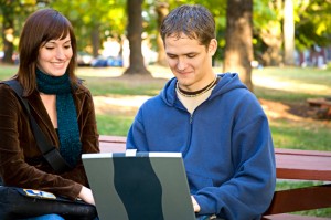 young adult on laptop